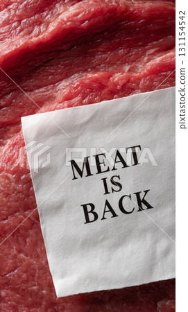 Fresh raw meat with a note stating meat is back, highlighting the return of traditional cuisine Fresh raw meat with a note stating meat is back, highlighting the return of traditional cuisine 131154542
