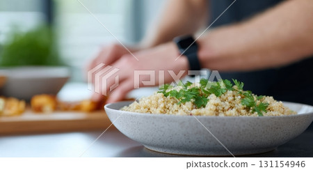 Hands are seen prepping healthy high-fiber foods in a wide kitchen, promoting healthy eating trends Hands are seen prepping healthy high-fiber foods in a wide kitchen, promoting healthy eating trends 131154946