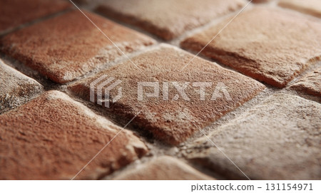 Handmade ceramic tiles in vibrant colors add creativity and texture to an accent wall in home renovation 131154971