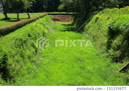 Kunohe Castle ruins with stone walls and moats under the blue sky (Iwate) 131155677