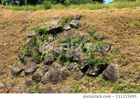 Kunohe Castle ruins with stone walls and moats under the blue sky (Iwate) 131155695
