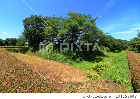 Kunohe Castle ruins with stone walls and moats under the blue sky (Iwate) 131155698