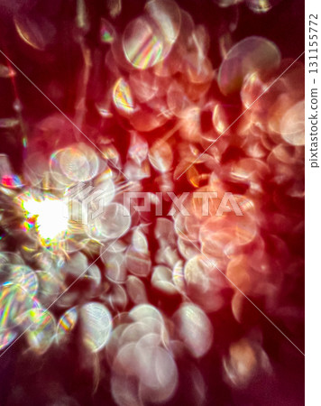 Colors dance in a blurred scene of shimmering lights and reflections during a lively celebration at dusk Colors dance in a blurred scene of shimmering lights and reflections during a lively celebration at dusk 131155772