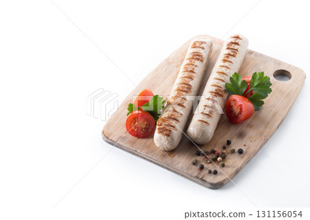 Grilled white sausages with cherry tomatoes and parsley Grilled white sausages with cherry tomatoes and parsley 131156054
