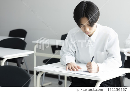 Male students taking classes Male students taking classes 131156567
