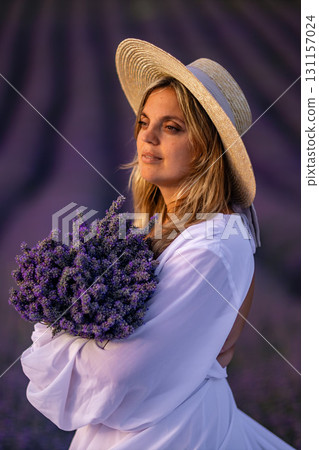 Lavender Field Woman Hat Sunset: Provence, France, summer photoshoot, showcasing beauty and nature. Lavender Field Woman Hat Sunset: Provence, France, summer photoshoot, showcasing beauty and nature. 131157024