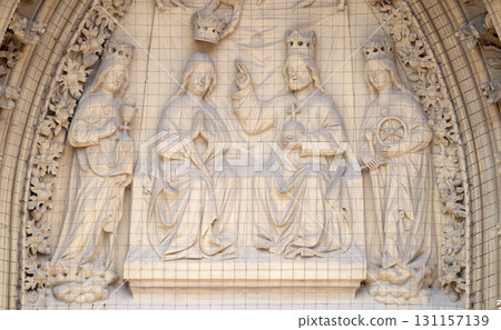 The tympanum shows the Coronation of the Virgin portal of the Marienkapelle in Wurzburg, Bavaria, Germany 131157139