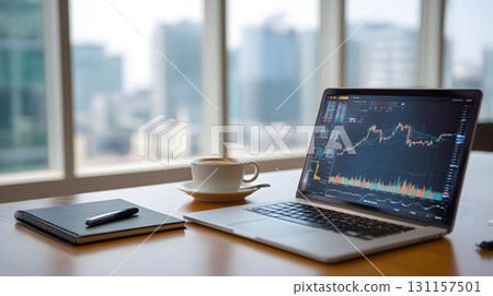 neat office scene with laptop displaying market overview 131157501