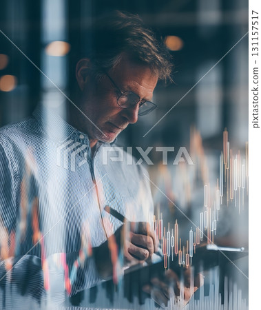 smart investor reviewing notes with financial charts overlay 131157517