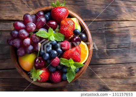 bowl of fruits fresh wooden background healthy 131157653