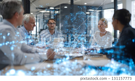 group of entrepreneurs using holographic data visualization during meeting 131157773