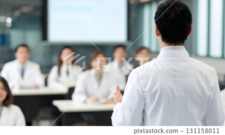 Young doctor presenting wellness awareness in seminar room Young doctor presenting wellness awareness in seminar room 131158011