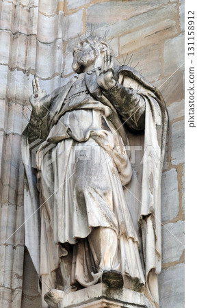 Statue of Saint on the facade of the Milan Cathedral, Duomo di Santa Maria Nascente, Milan, Lombardy, Italy 131158912