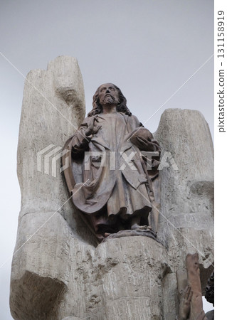 Christ the Saviour statue on the Altar of the Apostles in Wurzburg Cathedral dedicated to Saint Kilian, Bavaria, Germany Christ the Saviour statue on the Altar of the Apostles in Wurzburg Cathedral dedicated to Saint Kilian, Bavaria, Germany 131158919