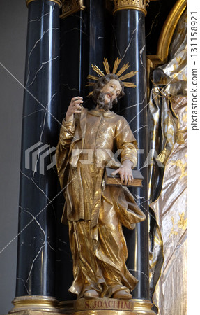 Saint Joachim statue on the Virgin Mary altar in the Neumunster Collegiate Church in Wurzburg, Germany 131158921