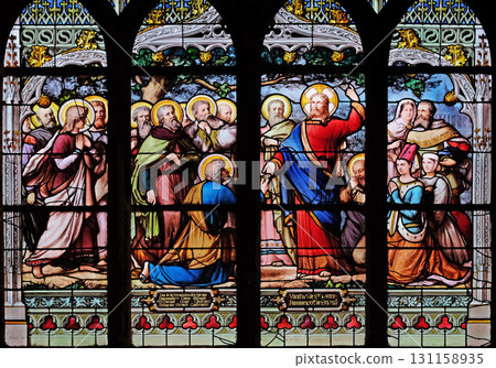 Jesus gives Peter the keys to the Kingdom, stained glass window in Saint Severin church in Paris, France 131158935