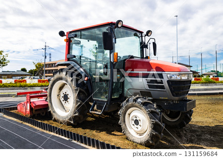Tractor with implement 131159684