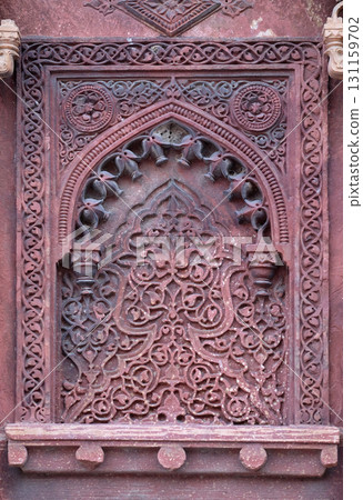 Stone pattern on a temple wall in Red Fort, Agra, UNESCO World heritage site, India Stone pattern on a temple wall in Red Fort, Agra, UNESCO World heritage site, India 131159702