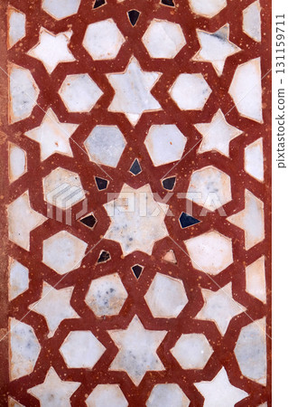 Beautiful stone carvings on the wall in Fatehpur Sikri complex, Uttar Pradesh, India 131159711