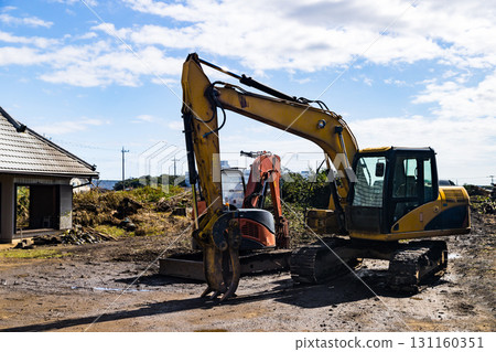 Demolition work site Heavy backhoe Demolition work site Heavy backhoe 131160351