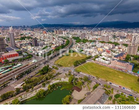Aerial view of Taichung City's East District and elevated railway. Taichung City, Taiwan 131160680