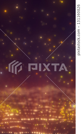 Glowing particles and lights in warm yellow-orange tones creating a dreamy starfield over a digital terrain 131160826