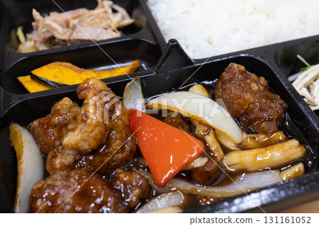 Delicious black vinegar sweet and sour pork lunch 131161052
