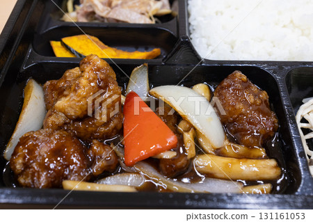 Delicious black vinegar sweet and sour pork lunch 131161053