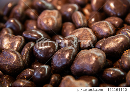 Chocolate-covered nuts. Lots of delicious treats on the store shelves. 131161130