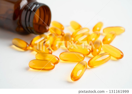 Fish oil or Cod liver oil gel in capsules with omega 3 vitamins, supplementary healthy food. Fish oil or Cod liver oil gel in capsules with omega 3 vitamins, supplementary healthy food. 131161999