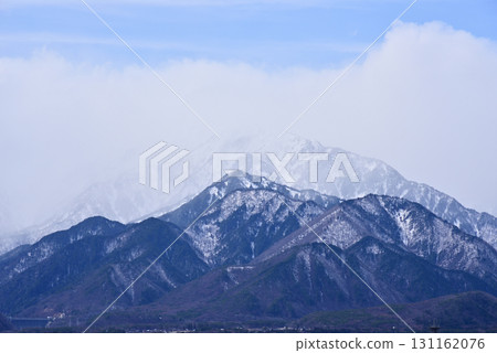 Shinshu scenery - Mount Renge in the Northern Alps shrouded in clouds 131162076