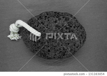 Black pumice stone 131163854