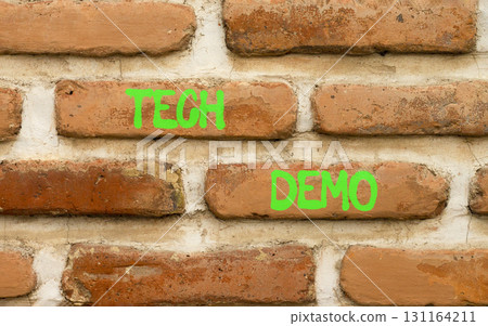Tech demo symbol. Concept word Tech demo on beautiful old brown brick wall. Beautiful old brown brick wall background. Old brick wall. Business tech demo concept. Copy space. Tech demo symbol. Concept word Tech demo on beautiful old brown brick wall. Beautiful old brown brick wall background. Old brick wall. Business tech demo concept. Copy space. 131164211