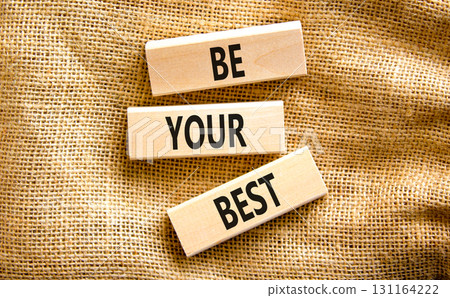 Motivational be your best symbol. Concept words Be your best on beautiful wooden blocks. Beautiful canvas table canvas background. Business motivational be your best concept. Copy space. Motivational be your best symbol. Concept words Be your best on beautiful wooden blocks. Beautiful canvas table canvas background. Business motivational be your best concept. Copy space. 131164222