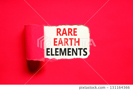 Rare earth elements symbol. Concept words Rare earth elements on beautiful white paper. Beautiful red paper background. Business and rare earth elements concept. Copy space. 131164366