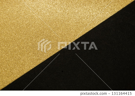 Split in the half of golden and black texture background 131164415