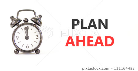 Plan ahead symbol. Concept word Plan ahead on beautiful white paper. Beautiful black alarm clock. Beautiful white paper background. Business plan ahead concept. Copy space. 131164482