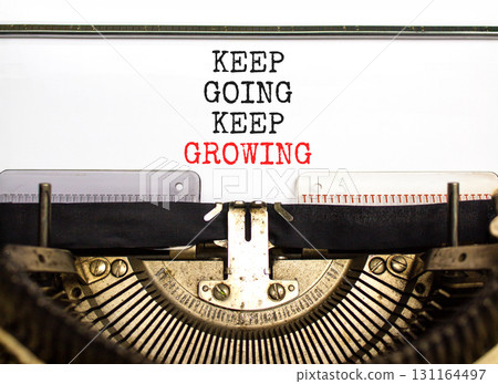 Keep going and growing symbol. Concept words phrase Keep going keep growing typed on beautiful retro old typewriter. Beautiful white background. Business Keep going and growing concept. Copy space. Keep going and growing symbol. Concept words phrase Keep going keep growing typed on beautiful retro old typewriter. Beautiful white background. Business Keep going and growing concept. Copy space. 131164497