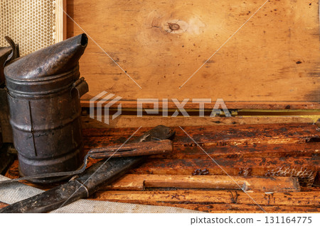 Very old beekeeper tools background 131164775