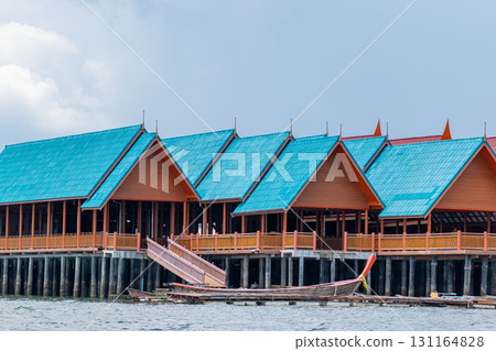 Wooden buildings with blue roofs in Koh Panyee village Wooden buildings with blue roofs in Koh Panyee village 131164828