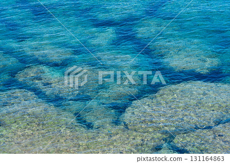 The crystal clear blue waters of Cape Higashi-Hennazaki, Miyakojima, Okinawa 131164863