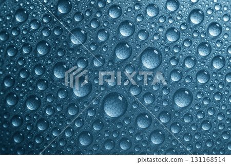 Macro close up of blue water droplets densely covering a textured background under even lighting. Wallpaper and design concept. 131168514