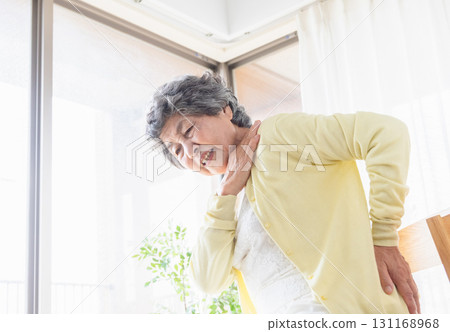 Seniors suffering from stiff shoulders and back pain 131168968