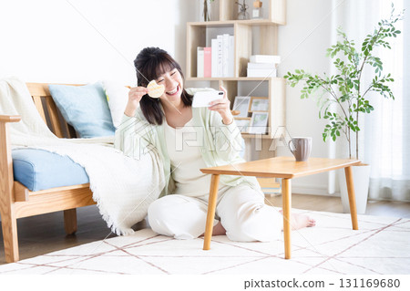 Young woman looking at a smartphone 131169680