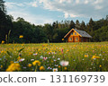 A cozy log cabin is nestled in a vibrant wildflower meadow under a cloudy sky, surrounded by a lush forest at sunset. 131169739