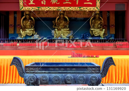 Hainan Island, Sanya: Nanshan Buddhist Center. View of the incense burner in front of the Temple 131169920