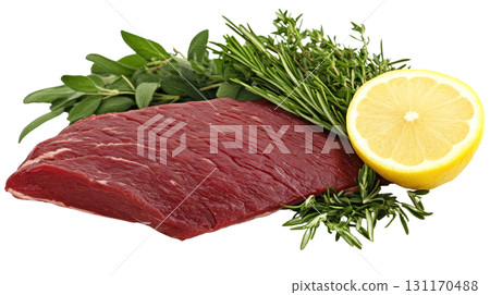 Fresh beef steak with herbs and lemon ready for cooking and marinating in a kitchen 131170488