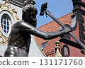 bronze statue of Tryton fountain in Gdansk Poland pigeon on the trident 131171760