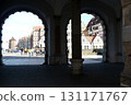 Old town square buildings lit by the sun Gdansk, Poland three archways 131171767