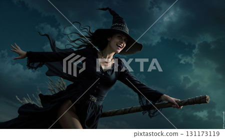 Beautiful young witch laughs sinisterly, witch flies on a broomstick on Halloween. 131173119